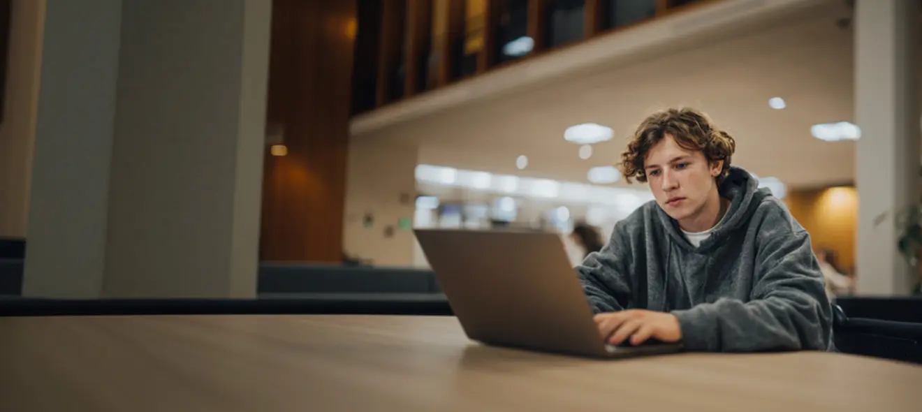 A Student Interacting With AI Tools