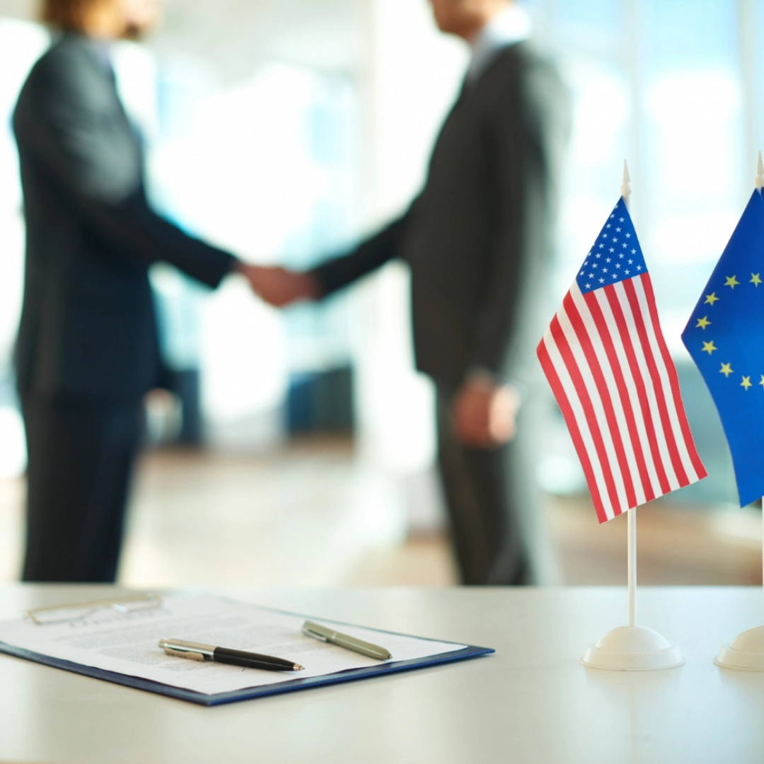 Two US & Europe Diplomats Shaking Hands