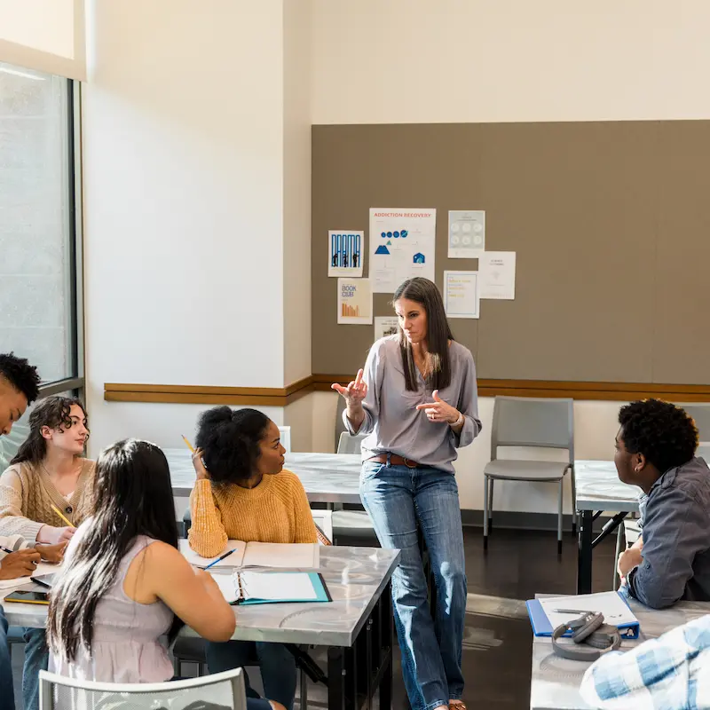 Professor with Multicultural Students in the Classroom